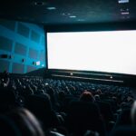 high angle shot of people watching movie inside the theater